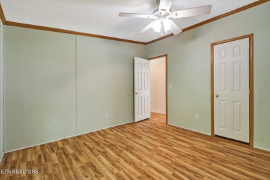 Three bedroom manufactured home with lake frontage on Lake on Lake Tansi Village Country Club in Tennessee - for sale on GolfHomes.com, golf home, golf lot