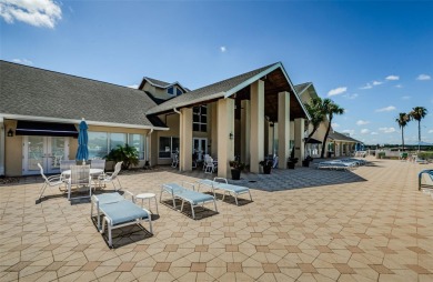 Welcome to this stunning 2-bedroom, plus a den, 2-bath home on Tampa Bay Golf and Country Club in Florida - for sale on GolfHomes.com, golf home, golf lot