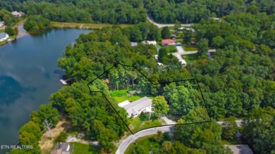 Three bedroom manufactured home with lake frontage on Lake on Lake Tansi Village Country Club in Tennessee - for sale on GolfHomes.com, golf home, golf lot