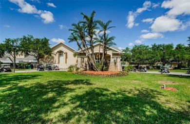 Welcome to this stunning 2-bedroom, plus a den, 2-bath home on Tampa Bay Golf and Country Club in Florida - for sale on GolfHomes.com, golf home, golf lot