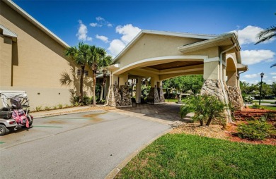 Welcome to this stunning 2-bedroom, plus a den, 2-bath home on Tampa Bay Golf and Country Club in Florida - for sale on GolfHomes.com, golf home, golf lot