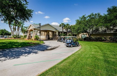 Welcome to this stunning 2-bedroom, plus a den, 2-bath home on Tampa Bay Golf and Country Club in Florida - for sale on GolfHomes.com, golf home, golf lot