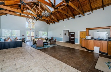 Welcome to this stunning 2-bedroom, plus a den, 2-bath home on Tampa Bay Golf and Country Club in Florida - for sale on GolfHomes.com, golf home, golf lot