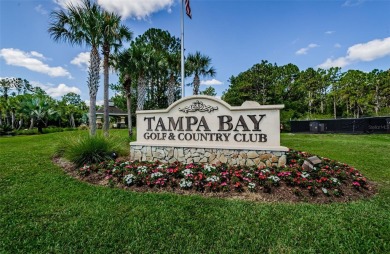 Welcome to this stunning 2-bedroom, plus a den, 2-bath home on Tampa Bay Golf and Country Club in Florida - for sale on GolfHomes.com, golf home, golf lot