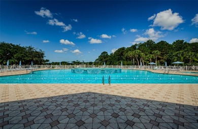 Welcome to this stunning 2-bedroom, plus a den, 2-bath home on Tampa Bay Golf and Country Club in Florida - for sale on GolfHomes.com, golf home, golf lot