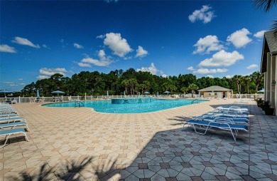 Welcome to this stunning 2-bedroom, plus a den, 2-bath home on Tampa Bay Golf and Country Club in Florida - for sale on GolfHomes.com, golf home, golf lot