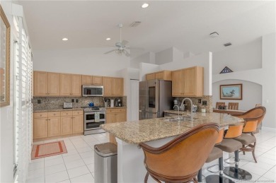 Charming Oasis in Ballantrae! Step inside this Light and Bright on Santa Lucia River Club in Florida - for sale on GolfHomes.com, golf home, golf lot