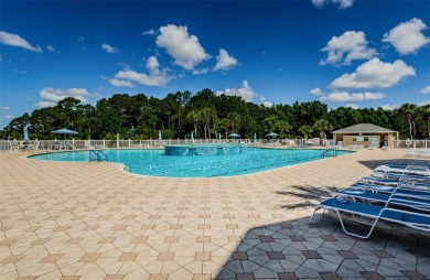 Welcome to this stunning 2-bedroom, plus a den, 2-bath home on Tampa Bay Golf and Country Club in Florida - for sale on GolfHomes.com, golf home, golf lot