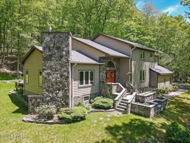 SECLUDED PARADISE in desirable golf community of Tanglwood Lakes on Paupack Hills Golf and Country Club in Pennsylvania - for sale on GolfHomes.com, golf home, golf lot