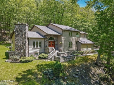 SECLUDED PARADISE in desirable golf community of Tanglwood Lakes on Paupack Hills Golf and Country Club in Pennsylvania - for sale on GolfHomes.com, golf home, golf lot