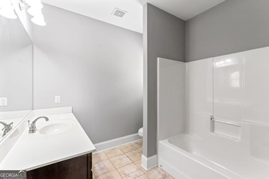 One of the rare find with 2 MASTER SUITES! - Prestigious Crystal on Crystal Lake Golf and Country Club in Georgia - for sale on GolfHomes.com, golf home, golf lot