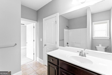 One of the rare find with 2 MASTER SUITES! - Prestigious Crystal on Crystal Lake Golf and Country Club in Georgia - for sale on GolfHomes.com, golf home, golf lot