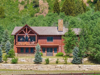 Located in the Residences at Snake River Sporting Club. At on Snake River Sporting Club in Wyoming - for sale on GolfHomes.com, golf home, golf lot