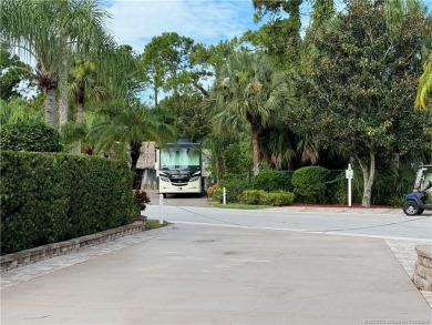 Priced to sell quickly, this beautifully landscaped lot backs on Motorcoach Resort Golf Course in Florida - for sale on GolfHomes.com, golf home, golf lot