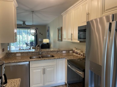 This is a true gem nestled on a golf course between Marco Island on Hammock Bay in Florida - for sale on GolfHomes.com, golf home, golf lot