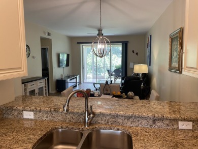 This is a true gem nestled on a golf course between Marco Island on Hammock Bay in Florida - for sale on GolfHomes.com, golf home, golf lot