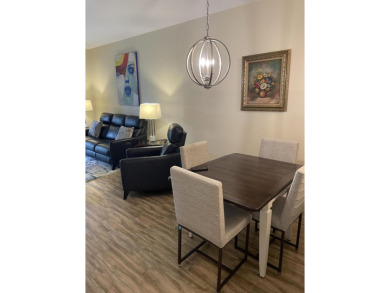 This is a true gem nestled on a golf course between Marco Island on Hammock Bay in Florida - for sale on GolfHomes.com, golf home, golf lot