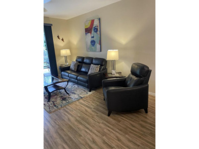 This is a true gem nestled on a golf course between Marco Island on Hammock Bay in Florida - for sale on GolfHomes.com, golf home, golf lot