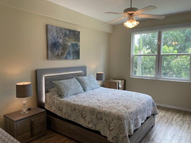 This is a true gem nestled on a golf course between Marco Island on Hammock Bay in Florida - for sale on GolfHomes.com, golf home, golf lot