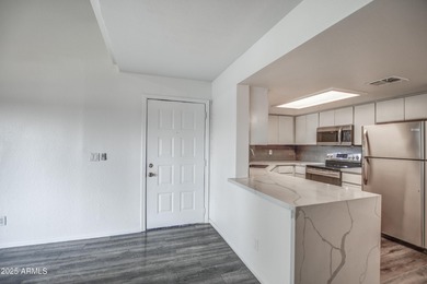 Enter to find living room w/vaulted ceilings flooded with on Stonecreek Golf Club in Arizona - for sale on GolfHomes.com, golf home, golf lot