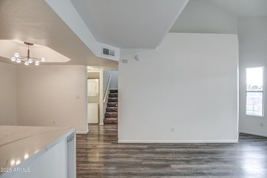 Enter to find living room w/vaulted ceilings flooded with on Stonecreek Golf Club in Arizona - for sale on GolfHomes.com, golf home, golf lot