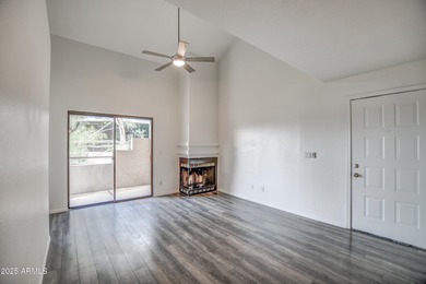 Enter to find living room w/vaulted ceilings flooded with on Stonecreek Golf Club in Arizona - for sale on GolfHomes.com, golf home, golf lot