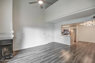 Enter to find living room w/vaulted ceilings flooded with on Stonecreek Golf Club in Arizona - for sale on GolfHomes.com, golf home, golf lot
