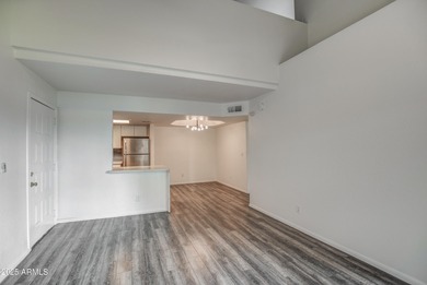 Enter to find living room w/vaulted ceilings flooded with on Stonecreek Golf Club in Arizona - for sale on GolfHomes.com, golf home, golf lot