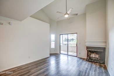 Enter to find living room w/vaulted ceilings flooded with on Stonecreek Golf Club in Arizona - for sale on GolfHomes.com, golf home, golf lot