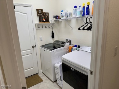 Beautiful, well-maintained Venice model pool home is NOT IN A on River Hall Country Club in Florida - for sale on GolfHomes.com, golf home, golf lot