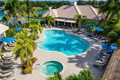 Spectacular lake and golf course views are featured in this on Worthington Country Club in Florida - for sale on GolfHomes.com, golf home, golf lot