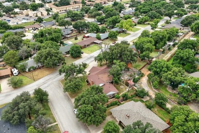 Step into this beautifully renovated home, just around the on Sweetwater Country Club in Texas - for sale on GolfHomes.com, golf home, golf lot