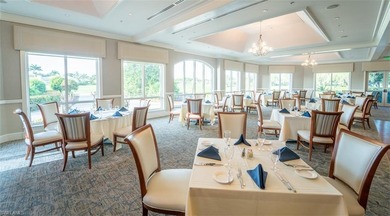 Spectacular lake and golf course views are featured in this on Worthington Country Club in Florida - for sale on GolfHomes.com, golf home, golf lot