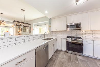 Beautifully updated ranch condo in the sought-after Stonebridge on Stonebridge Golf Club in Michigan - for sale on GolfHomes.com, golf home, golf lot