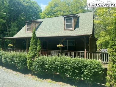 Charming Mountain Cabin located in Linville Land Harbor. This on Land Harbor Golf Course in North Carolina - for sale on GolfHomes.com, golf home, golf lot