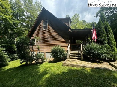 Charming Mountain Cabin located in Linville Land Harbor. This on Land Harbor Golf Course in North Carolina - for sale on GolfHomes.com, golf home, golf lot