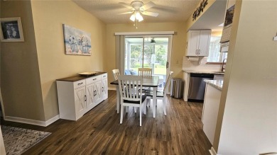 This two-bedroom, two-bathroom home with a two-car garage is on Royal Oaks Golf Club in Florida - for sale on GolfHomes.com, golf home, golf lot