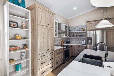 Beautifully updated single-family home in the sought-after on Pelican Sound Golf and River Club in Florida - for sale on GolfHomes.com, golf home, golf lot