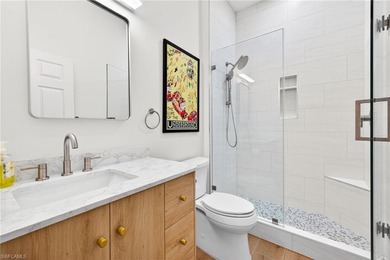 Beautifully updated single-family home in the sought-after on Pelican Sound Golf and River Club in Florida - for sale on GolfHomes.com, golf home, golf lot