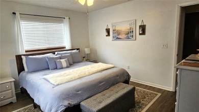 This two-bedroom, two-bathroom home with a two-car garage is on Royal Oaks Golf Club in Florida - for sale on GolfHomes.com, golf home, golf lot