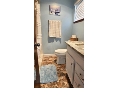 This two-bedroom, two-bathroom home with a two-car garage is on Royal Oaks Golf Club in Florida - for sale on GolfHomes.com, golf home, golf lot