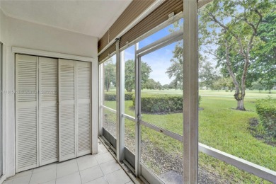 ENJOY ENDLESS GOLF COURSE VIEWS FROM YOUR FIRST FLOOR CONDO WITH on  in Florida - for sale on GolfHomes.com, golf home, golf lot