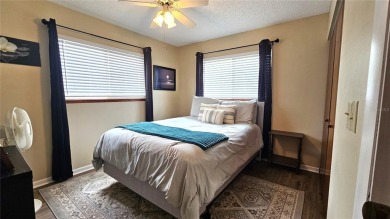 This two-bedroom, two-bathroom home with a two-car garage is on Royal Oaks Golf Club in Florida - for sale on GolfHomes.com, golf home, golf lot