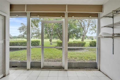 ENJOY ENDLESS GOLF COURSE VIEWS FROM YOUR FIRST FLOOR CONDO WITH on  in Florida - for sale on GolfHomes.com, golf home, golf lot