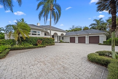This Custom-built residence is thoughtfully designed to capture on The Loxahatchee Club in Florida - for sale on GolfHomes.com, golf home, golf lot