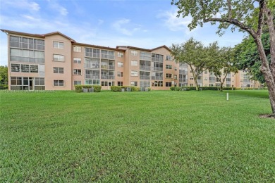 ENJOY ENDLESS GOLF COURSE VIEWS FROM YOUR FIRST FLOOR CONDO WITH on  in Florida - for sale on GolfHomes.com, golf home, golf lot