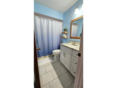 This two-bedroom, two-bathroom home with a two-car garage is on Royal Oaks Golf Club in Florida - for sale on GolfHomes.com, golf home, golf lot