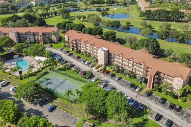 ENJOY ENDLESS GOLF COURSE VIEWS FROM YOUR FIRST FLOOR CONDO WITH on  in Florida - for sale on GolfHomes.com, golf home, golf lot