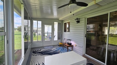 This two-bedroom, two-bathroom home with a two-car garage is on Royal Oaks Golf Club in Florida - for sale on GolfHomes.com, golf home, golf lot