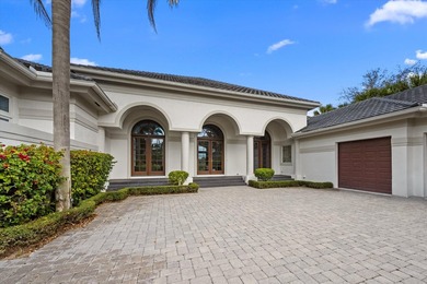 This Custom-built residence is thoughtfully designed to capture on The Loxahatchee Club in Florida - for sale on GolfHomes.com, golf home, golf lot